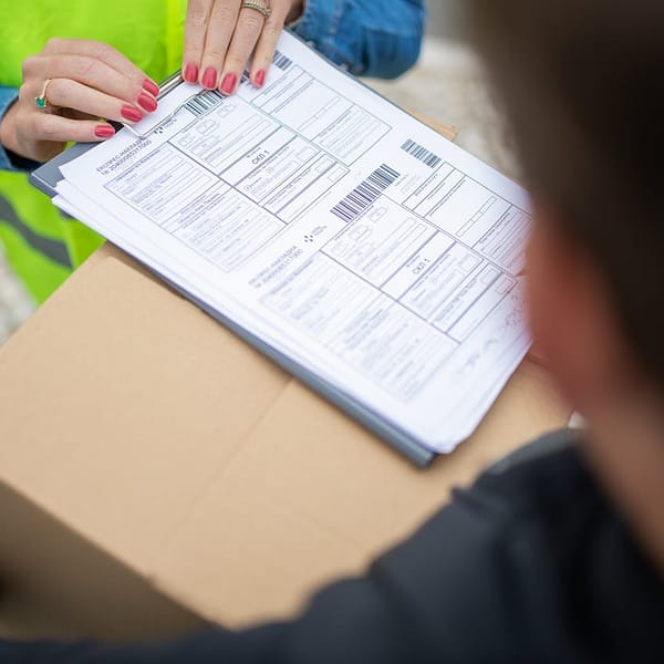 papiers à signer pour la réception d'un colis